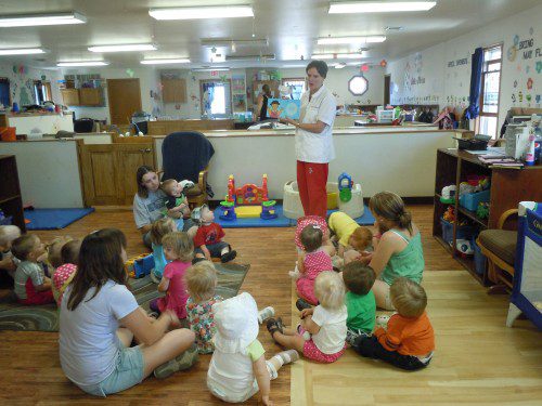 Even the infants were captivated during story time with Dr. Kim Everson
