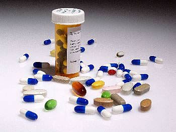 Pill vial and pills Pill vial and pills